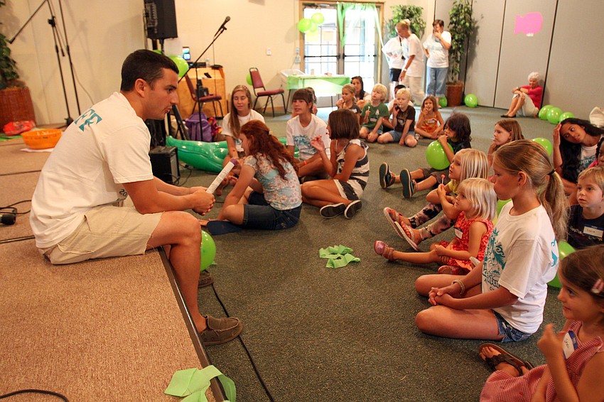Pastoral intern T.J. Cofield tells the story of Moses and the Burning Bush Monday, August 8 during vacation bible school at Siesta Key Chapel.
