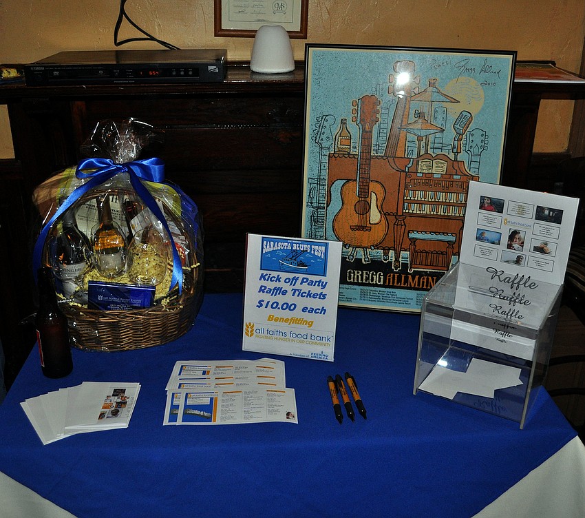 The raffle table was filled with all sorts of prizes and all the money benefitted All Faiths Food Bank.