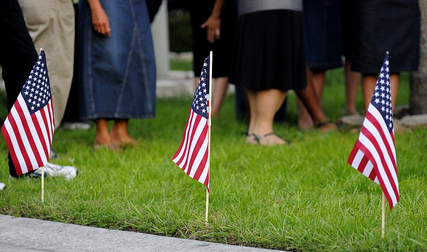 American flags lined the grass outside the home of U.S. Army Spc. 4 Patrick Lay II, who was killed Aug. 11 while serving in Afghanistan.