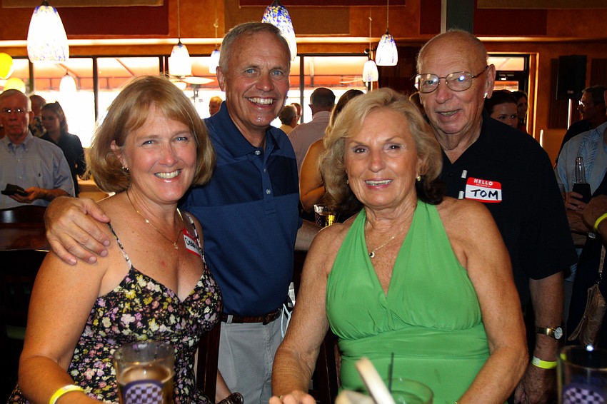 Debbie and John Ask pose with Tom and Wanda Minnich