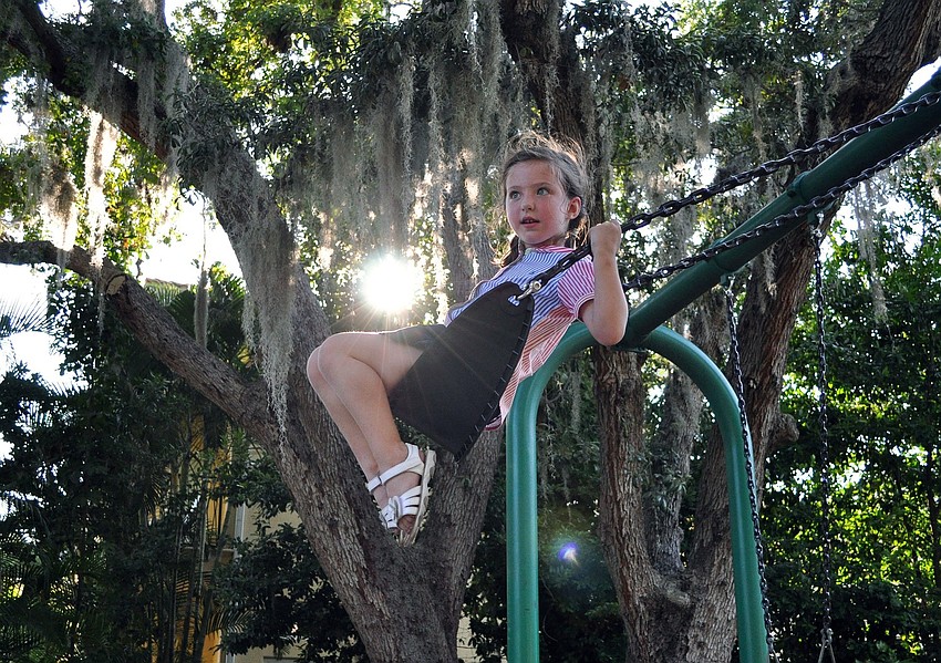 Samantha Sargent, 4 Â½, shows off how high she can swing Saturday, June 18 at Laurel Park.