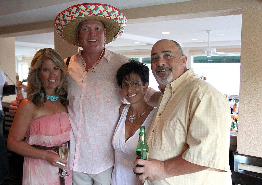 Chris and Jeff McKee with Mary Ann and Frank Nocco.