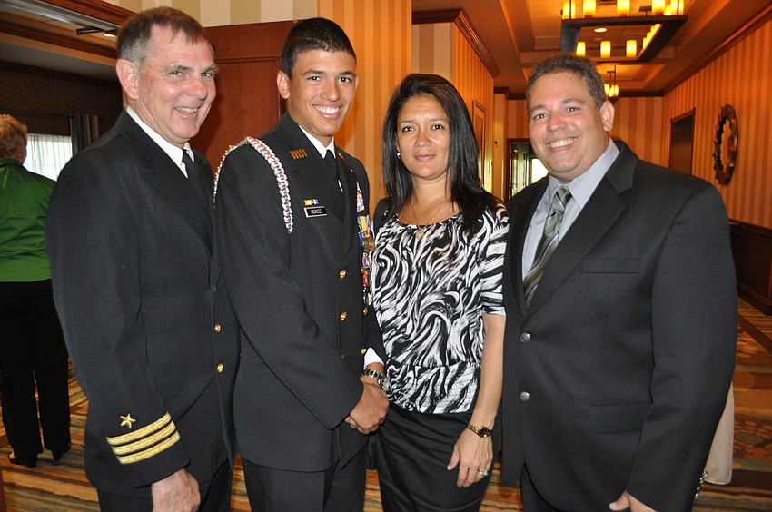Senior Naval Science Instructor Steve Bartek of North Port High School came out with Cadet Daniel Munoz and his parents, Wendy and Enrique Munoz.