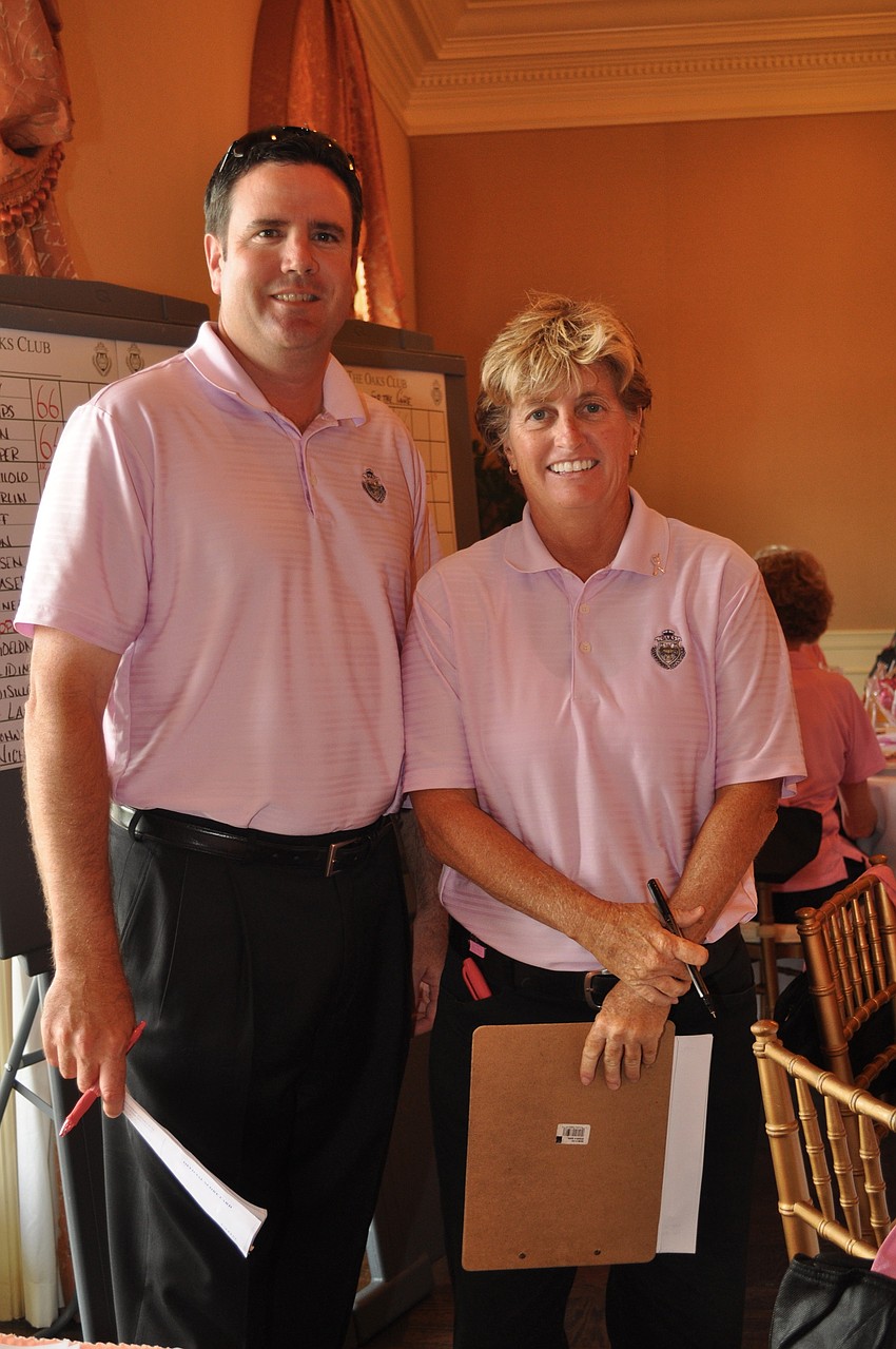 Director of golf Tim Beckwith and assistant golf pro Shari Lindsey