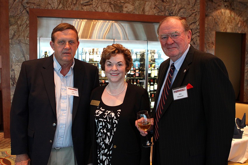 Jim Lilley, Melodee Dougherty and Jim Hesson on Thursday, March 31 during the monthly dinner meeting of the Sarasota Republican Club at the Sarasota Yacht Club.