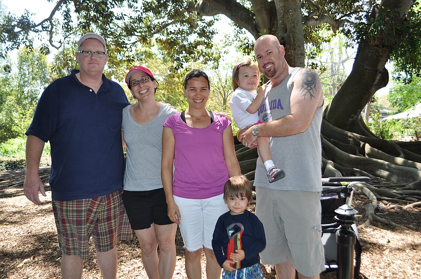 David and Teresa Lever and Misty and Brian Ellis with their 3-year-old twins, Zachary and Misty