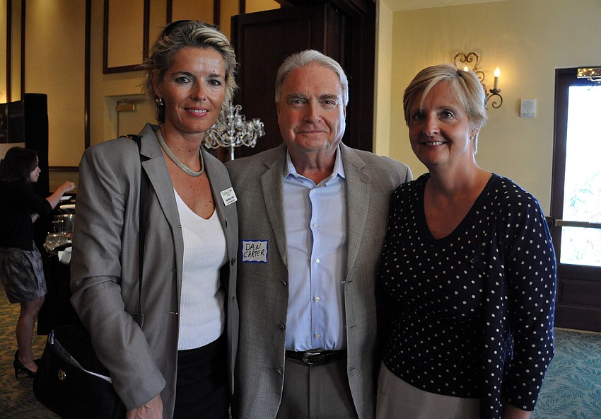 Aida Matic of Tidewell Hospice and Dan and LIsa Carter of Carter HRM Group.