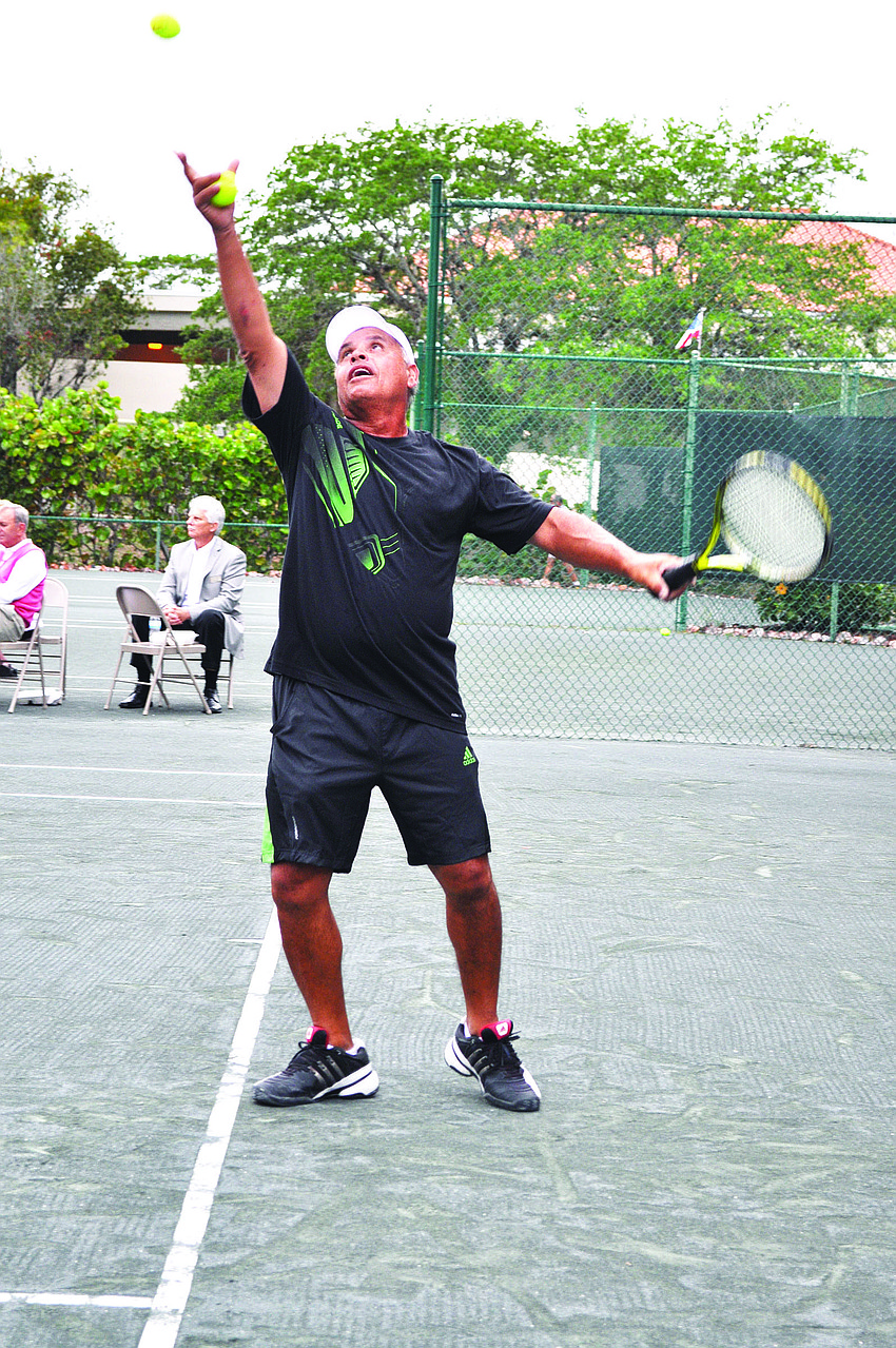 Sammy Aviles serves the ball.