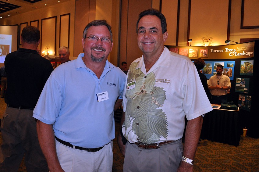Greg Hodge of Holland Construction and Darrell Turner of Turner Tree and Landscape both had booths at this year's trade show.