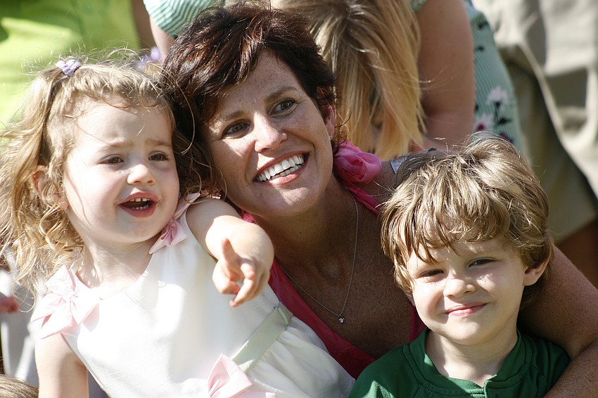 Bella Juliano, 2, enjoyed the egg hunt with her mom, Paddi, and brother, Nico, 3.
