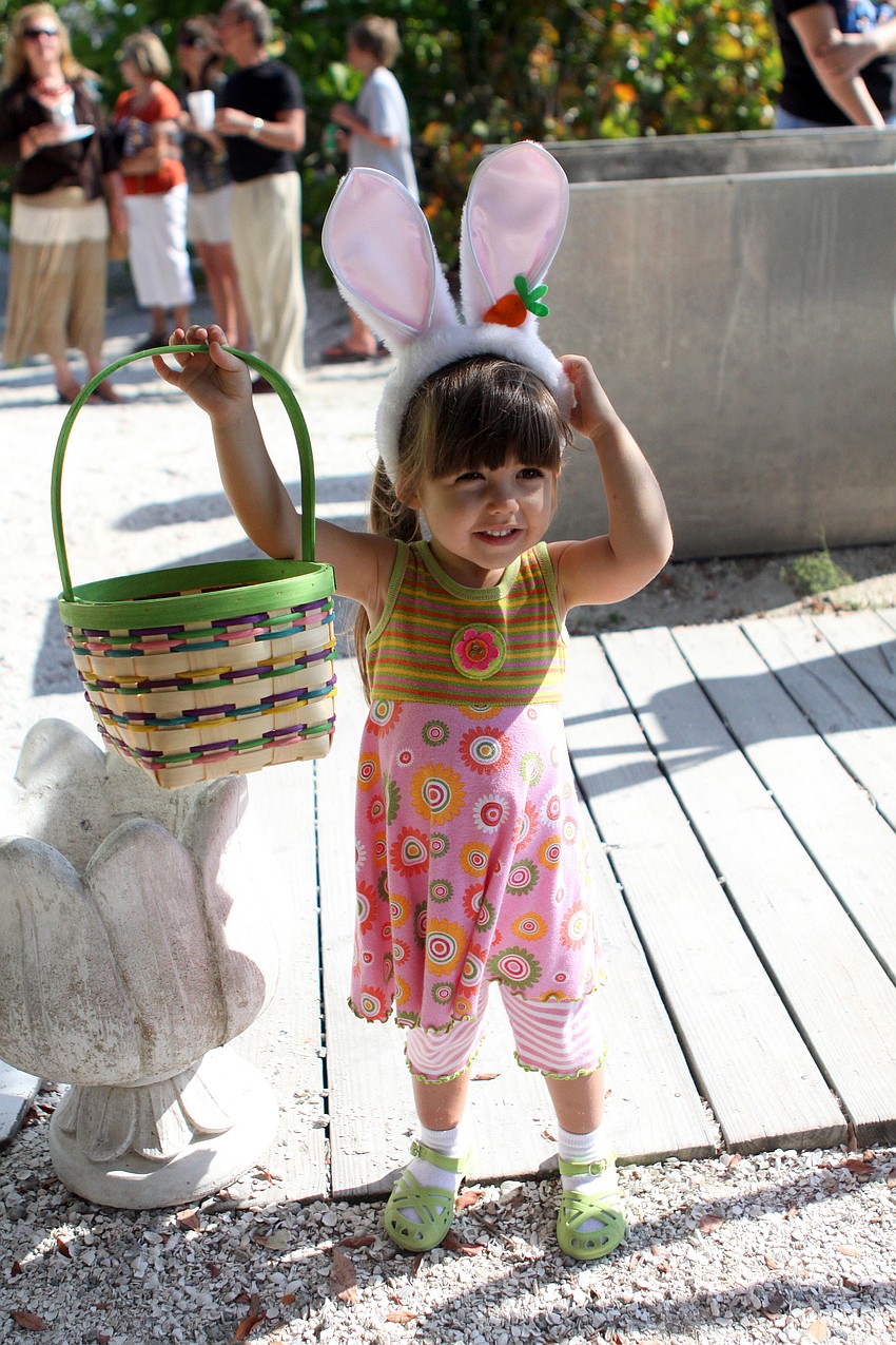 Coral Sheridan shows off her Easter basket while wearing her very own Easter bunny ears on Saturday, April 23 at Mar Vista's Easter egg hunt.