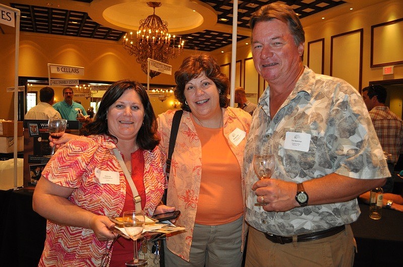 Donna Gildelamadrid and Maureen Stasi of D'Vines Wine Gift Emporium with Tim Speicher of Captain Eddies