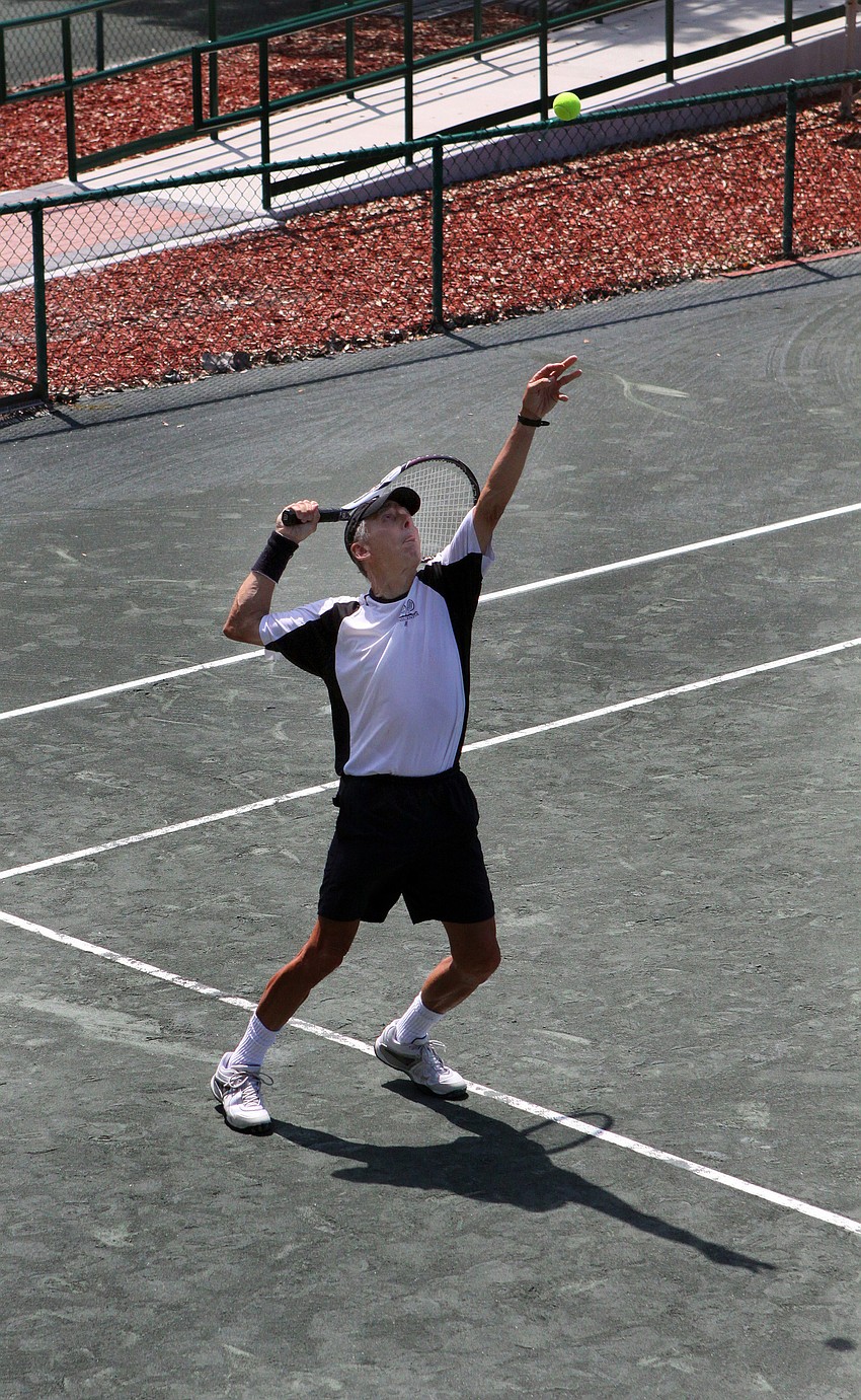 John Mrachek serves Wednesday, April 27 during the Longboat Key Tennis Center's 2011 Spring League championships.