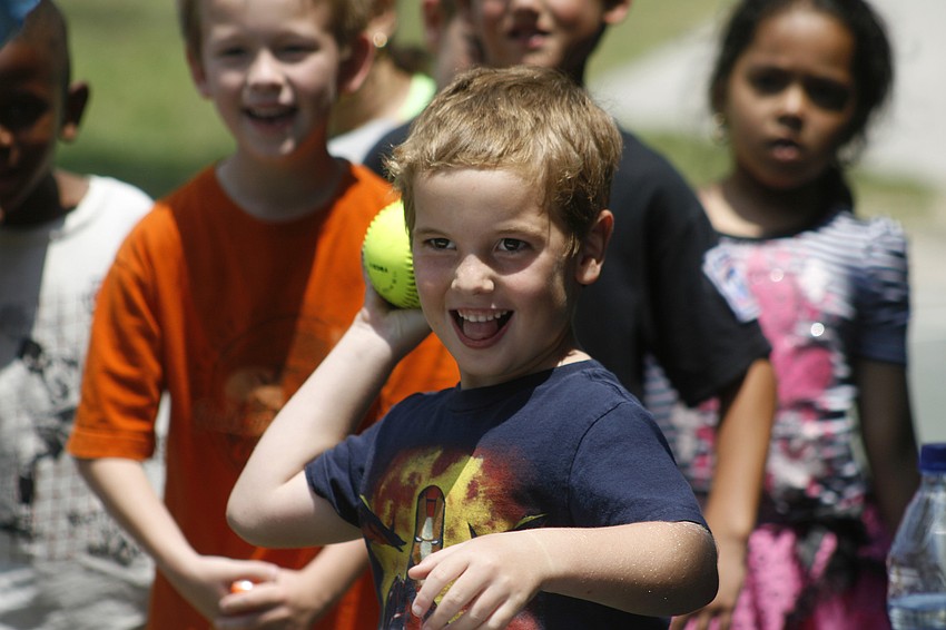 Ty Dunn aimed carefully to try to dunk teacher Bunni Roberts.