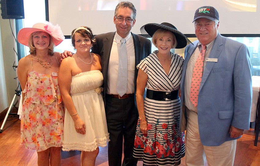 Assistant chair Mari Zevin, jennifer and Gary Contessa, Kathie Pokoik and Chair Lee Pokoik pose together on Saturday, May 7 at the Kentucky Derby party at the Sarasota Yacht Club.