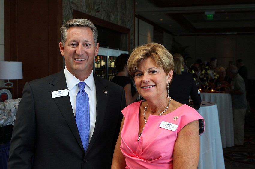 David Call and Kathy Leavesley of Fifth Third Bank pose together Tuesday, May 17 during the 