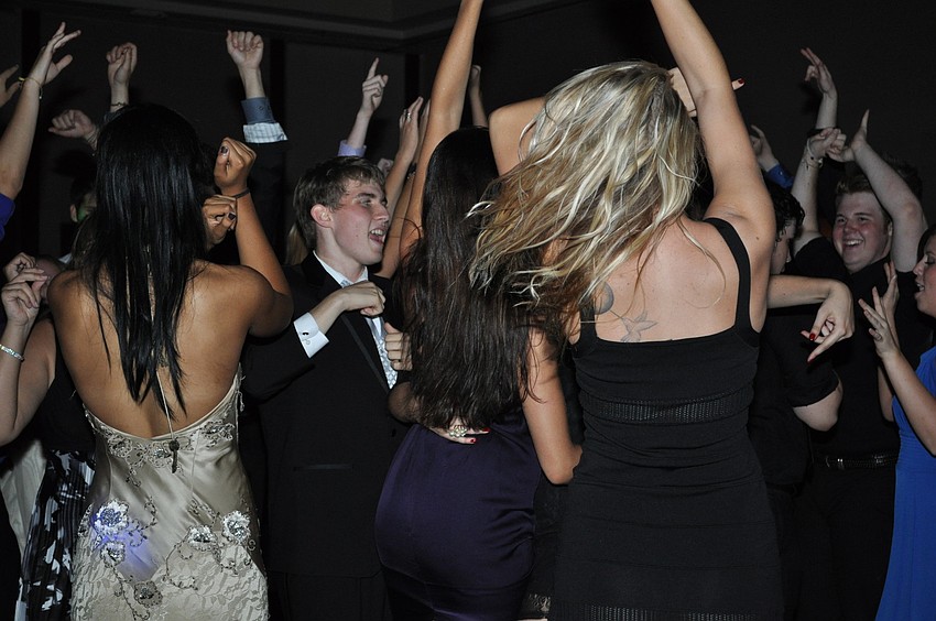 Students rock out on the dance floor.