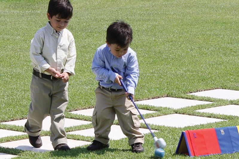 Evan and Carter Okuhara enjoyed a game of Smash Golf.