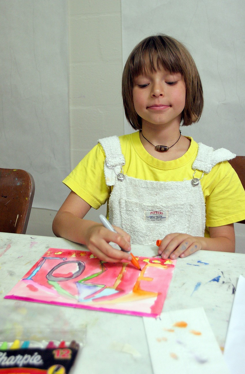 Josie Schiffer, 8, added some orange Sharpie to her piece that she created Tuesday, June 14 during the It's All Greek To Me! summer art class at Art Center Sarasota.