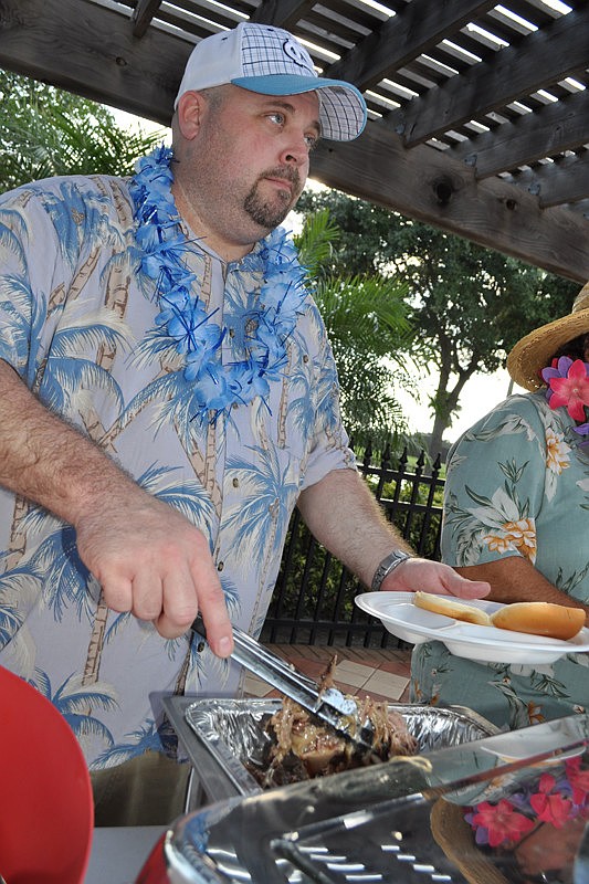 Neil Nolan dished out barbecue to guests.