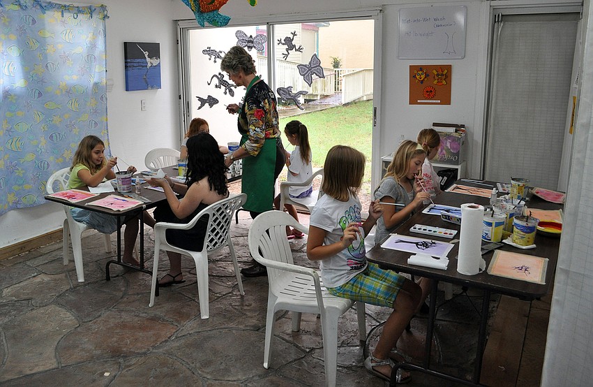 Seven girls were instructed by Charlotte Smith during the â€œFollow That Lineâ€ summer camp Friday, July 8 at the Art and Photography Studio of Colleen Cassidy.