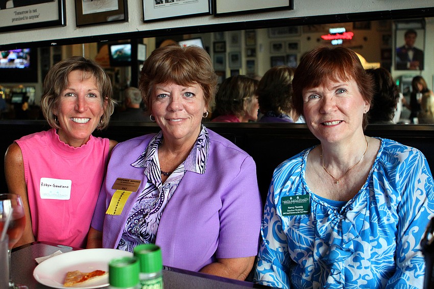 Robyn Gaudiano, Pat Martin and Nancy Taussig pose together at the Longboat Key Chamber event Thursday, July 21 at the Sports Page.