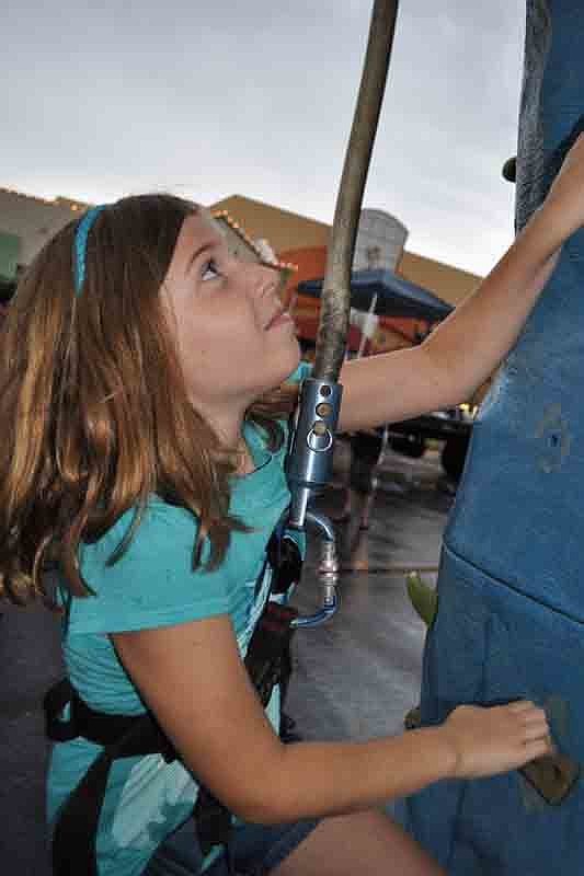 Keeley Cleland, 7, tackled the hardest part of the rock climbing wall.