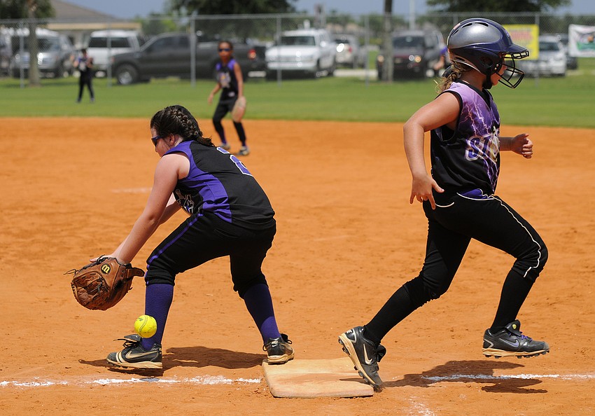 Mikayla Desantis beat the throw to first base and advanced to second on the error.