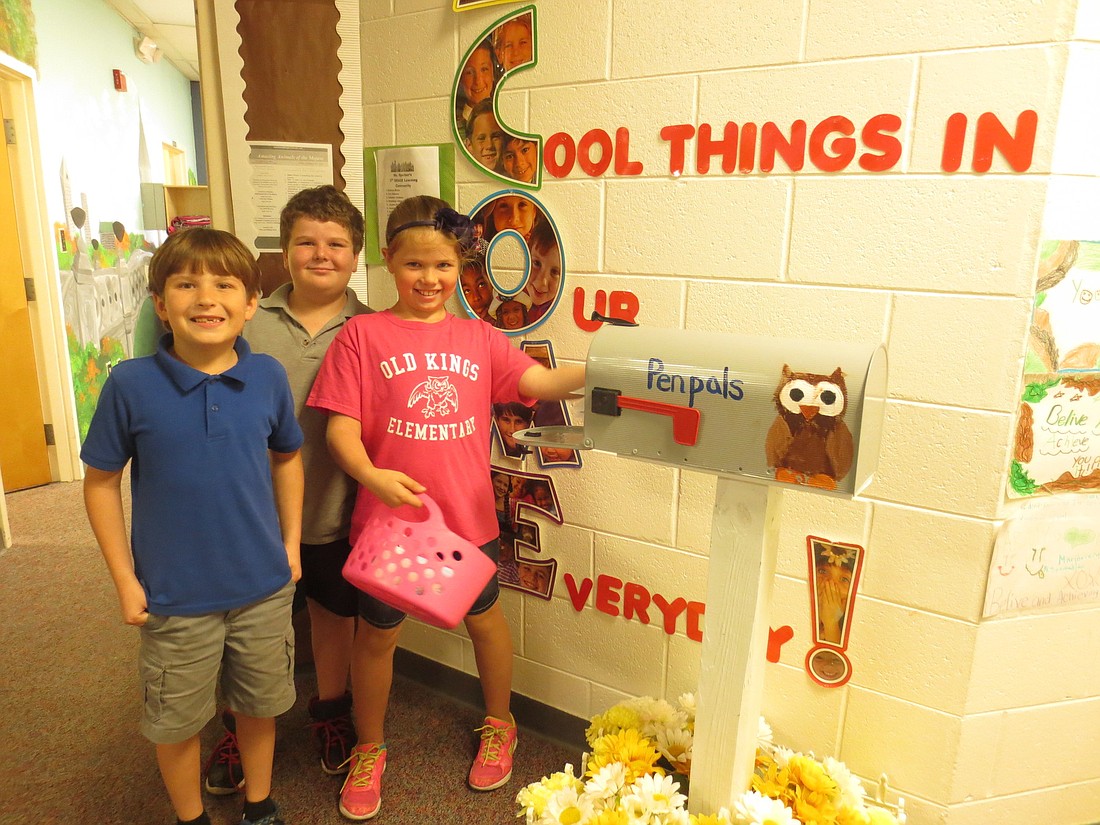 Dickinson and Sperber have matching mailboxes outside their classrooms, where students deliver the mail.