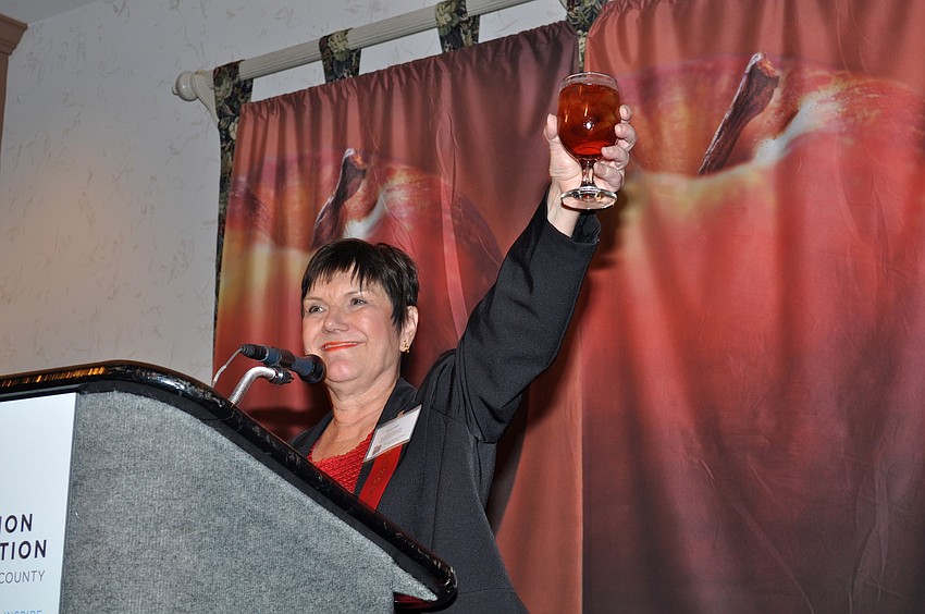 Karen Johns, Lakeview Elementary, raised her glass in a toast to teachers.