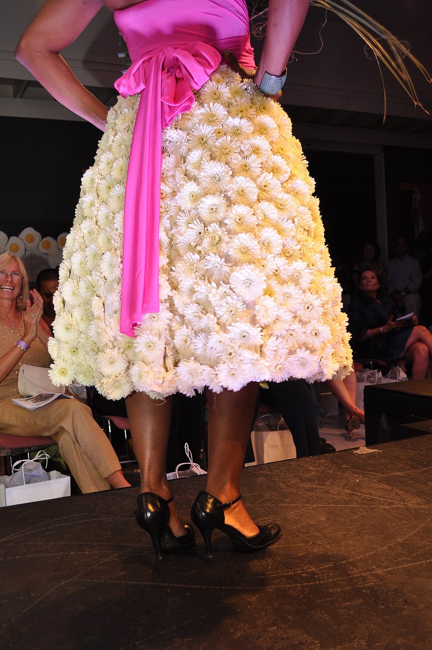 Fayanne Hayes collaborated with Ron Carter of Mr. Florist to create this white mum skirt.