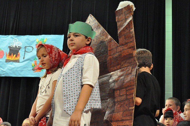 Villagers  Juliana Castrogiovanni and Nicholas Cassano tell the soldiers, 