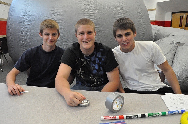 Braden River High School students Brett King, Tim Kimbrell and Brad Mottram manned the Star Lab Planetarium.