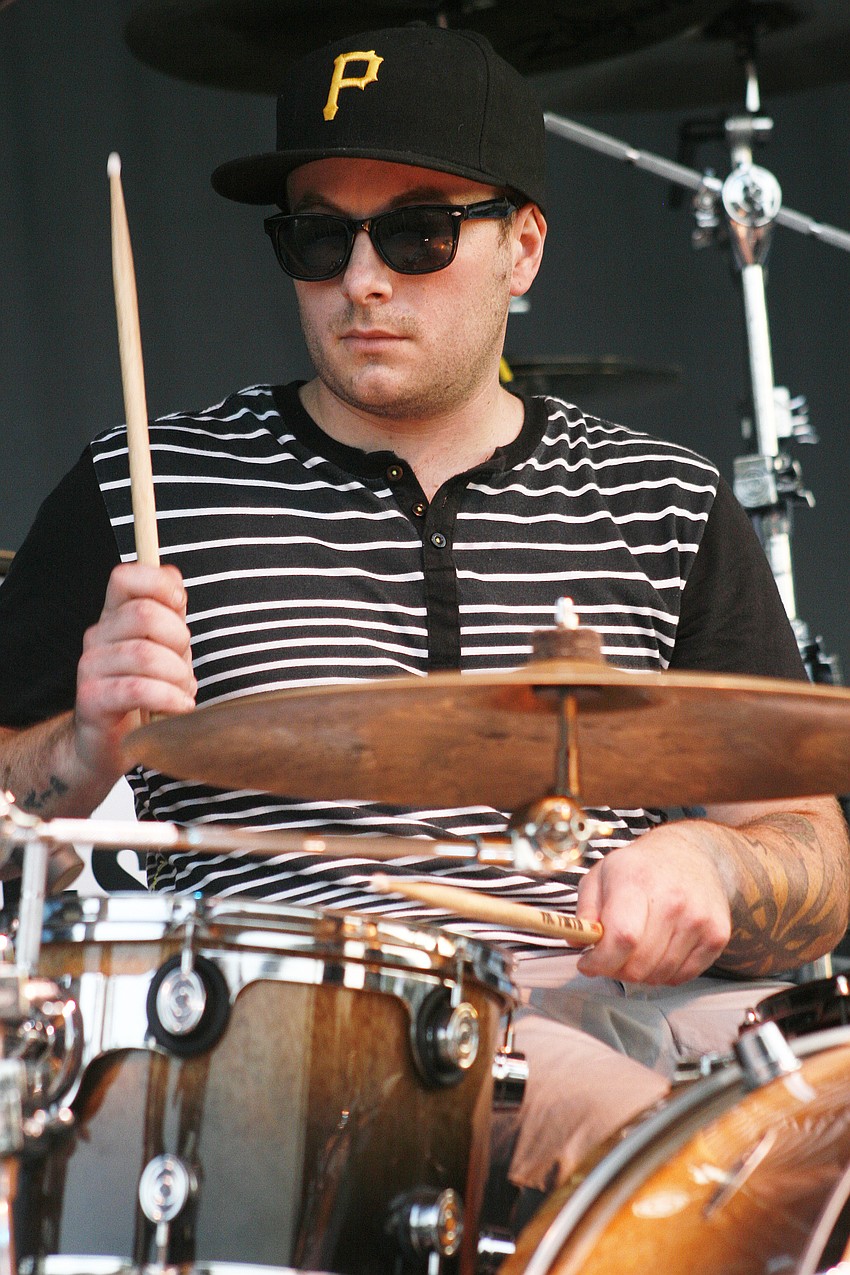 Joshua Allen plays drums for Tigerweather.