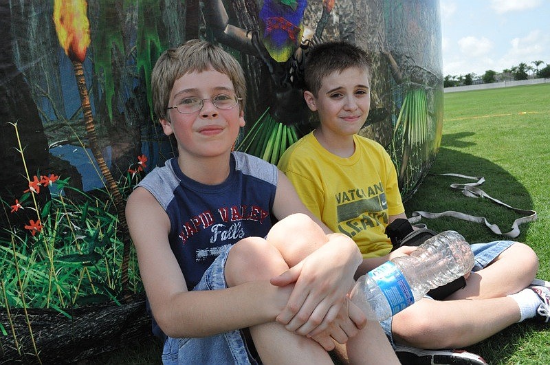 Rafael Gajowczyk and Noah Shick found a shady spot to rest.