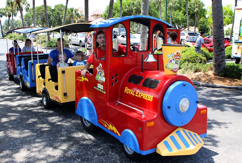 Kids and their parents get a ride on the Royal Express on Sunday, April 17 during South Bay's Family Fun Day.