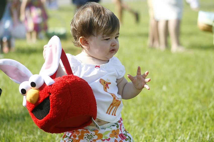 Kylee Davis, 1, took her time selecting her Easter eggs.