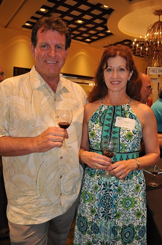 Bill Holtzclaw and Cate Balcom sampled wines.