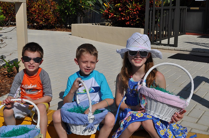 Waiting patiently for the Easter Bunny to arrive are the Forsyth children: Chase, Camden and Braiden.