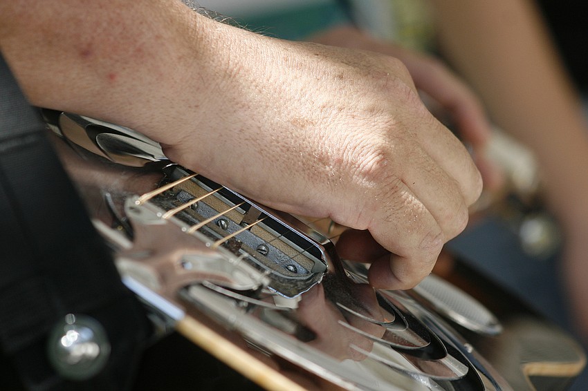 Musicians performed on a variety of instruments, including the dobro.