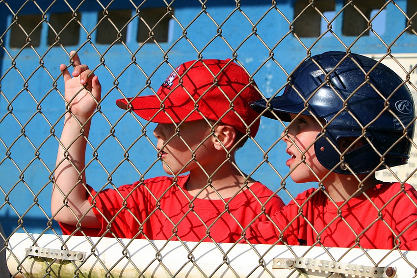 Dominic Cuffaro and Carson Spence watch their teammate at bat during their final game of the Spring season Monday, May 9 at Twin Lakes Park.