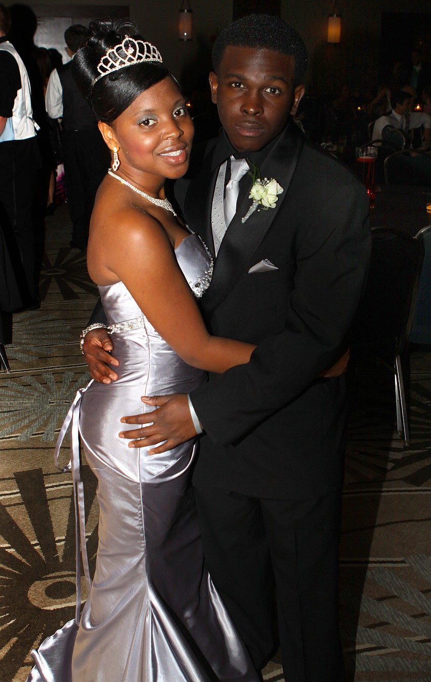 Shauntavia Green and Liejerren Swilley pose together Saturday, May 14 at the Sarasota High School's prom at the Hyatt Regency.
