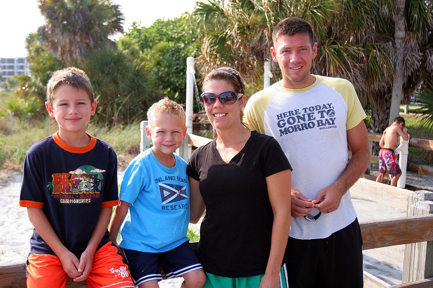 Logan, 8, Kaden, 5, Amy and Errin Tribble