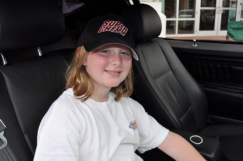 Madison Egan, 9, found shelter from the rain in her dad's 1973 Chevrolet.