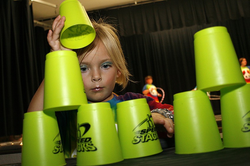 Collier Moser showed off her cup-stacking skills during one of the numbers.