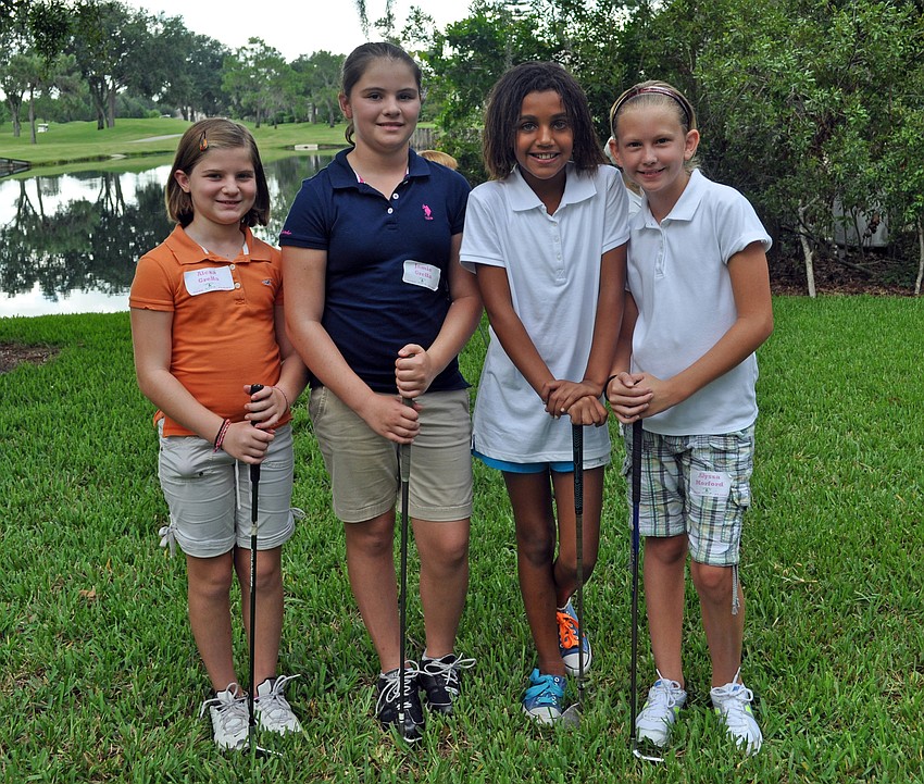 Alexa Grella, 9, Jamie Grella, 11, Paige McDonald, 10, and Alyssa Morford, 11 enjoyed this yearâ€™s Mustang Golf Camp.