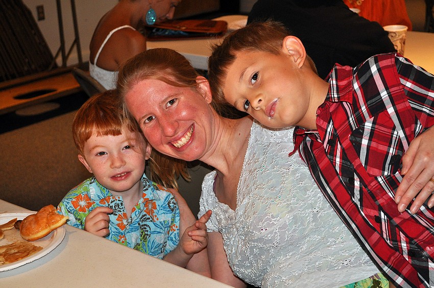 Lori Benhardt poses with her sons Ben, 3 Â½, and Alex, 6 Â½, at the pancake breakfast put on by the Knights of Columbus Sunday, July 17 at St. Michael the Archangel Catholic Church.