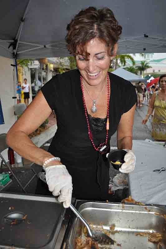 Lisa Clift dished out barbecue for El Lago Ranchero restaurant.