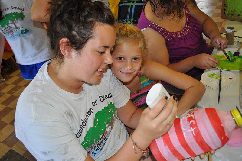 Emily Gauthier, right, supervised counselor Vennessa Cowsert's handiwork.