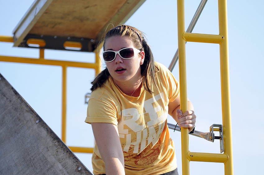 Ashley Hall spent the morning putting together the staff scaffolding.